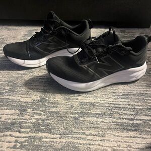 New Balance Men's Black Athletic Shoes with White Soles